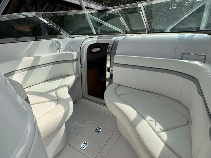  Yacht Photos Pics 2008 Donzi 38 ZSF boat interior with white seating and open cabin door.