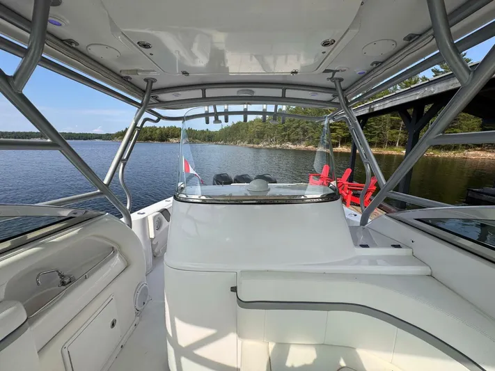  Yacht Photos Pics 2008 Donzi 38 ZSF boat interior with lake view and dockside chairs.