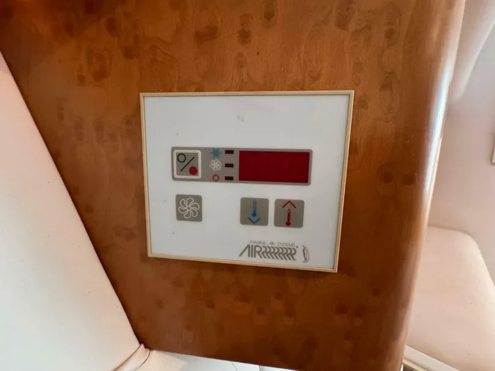  Yacht Photos Pics Control panel on 2008 Donzi 38 ZSF boat, featuring temperature and fan settings.