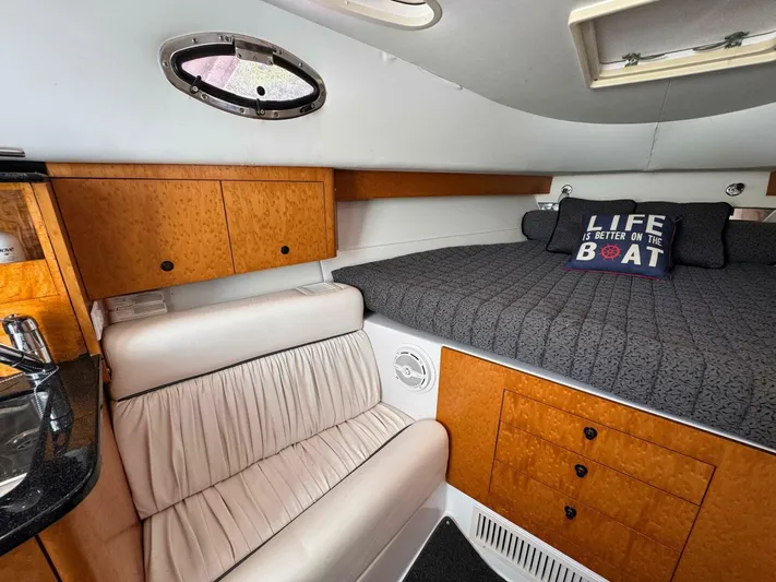  Yacht Photos Pics Interior of 2008 Donzi 38 ZSF boat with cozy seating and bed.