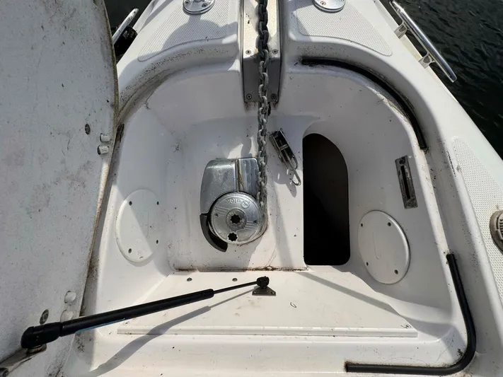 Yacht Photos Pics Anchor compartment of a 2008 Donzi 38 ZSF boat with chain and winch.