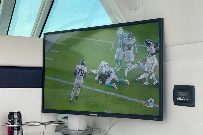  Yacht Photos Pics Television showing football game inside 2010 Sea Ray 450 Sundancer yacht.