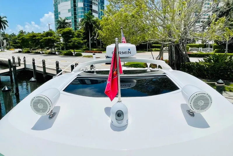  Yacht Photos Pics 2010 Sea Ray 450 Sundancer yacht docked, featuring Garmin equipment and outdoor speakers.