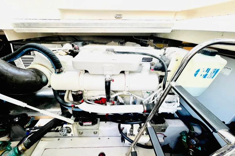  Yacht Photos Pics Engine compartment of a 2010 Sea Ray 450 Sundancer boat, showcasing mechanical components.