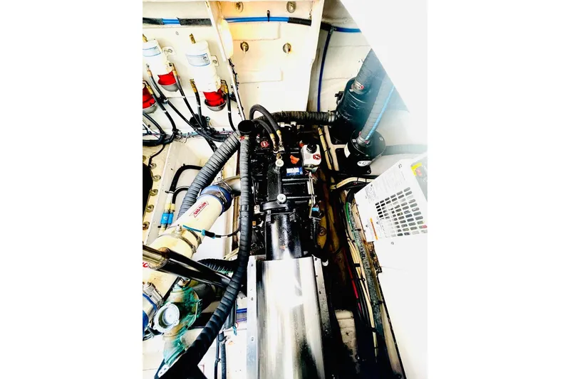  Yacht Photos Pics Engine room of 2010 Sea Ray 450 Sundancer, showcasing mechanical components and wiring.