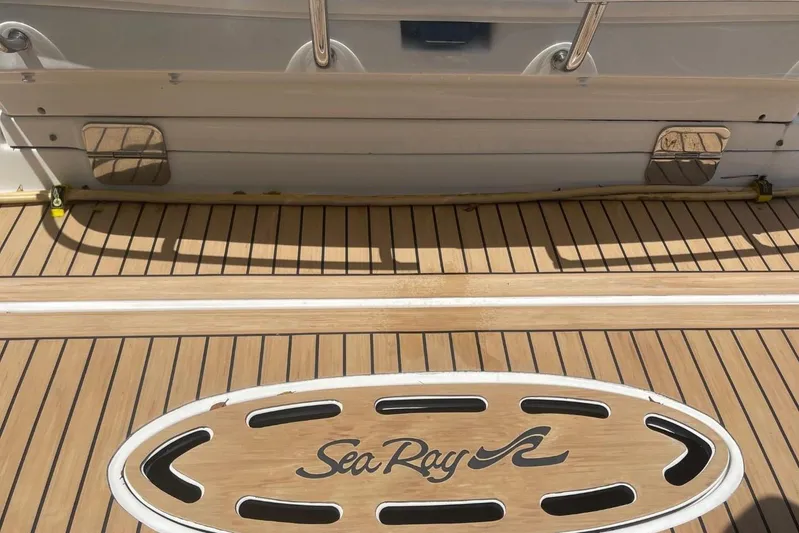  Yacht Photos Pics 2010 Sea Ray 450 Sundancer swim platform with teak decking and logo.