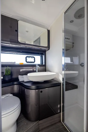  Yacht Photos Pics 2024 Azimut Verve 42 yacht bathroom with modern fixtures and sleek design.