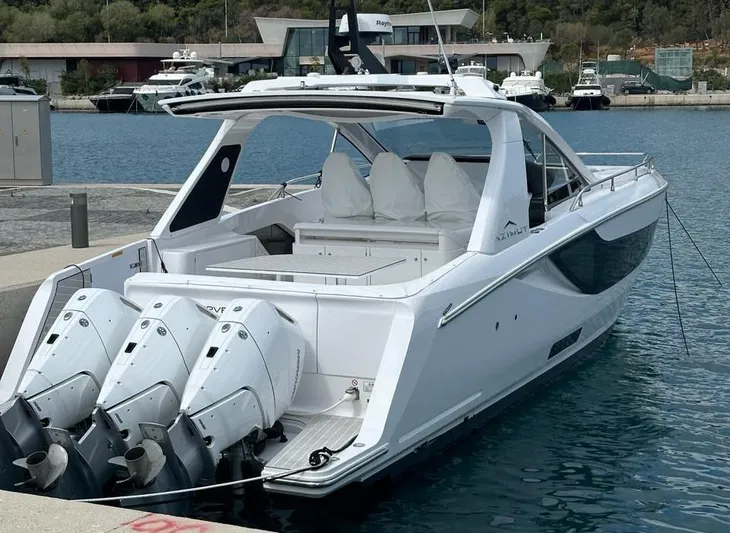  Yacht Photos Pics 2024 Azimut Verve 42 luxury yacht docked with triple outboard engines.