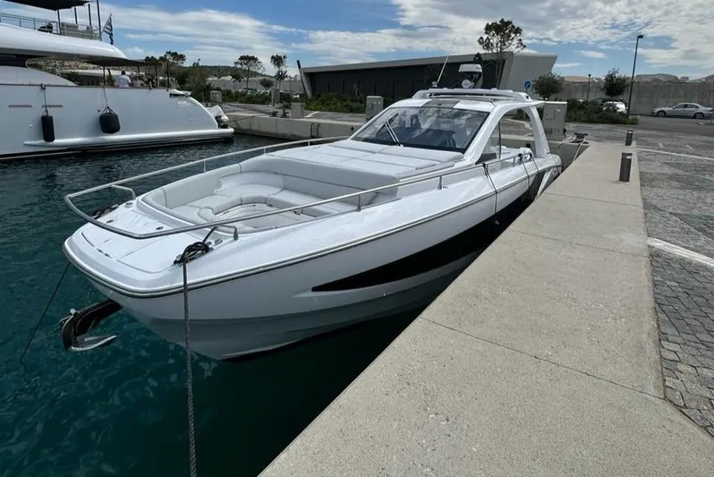  Yacht Photos Pics 2024 Azimut Verve 42 yacht docked at marina, showcasing sleek design and luxury features.