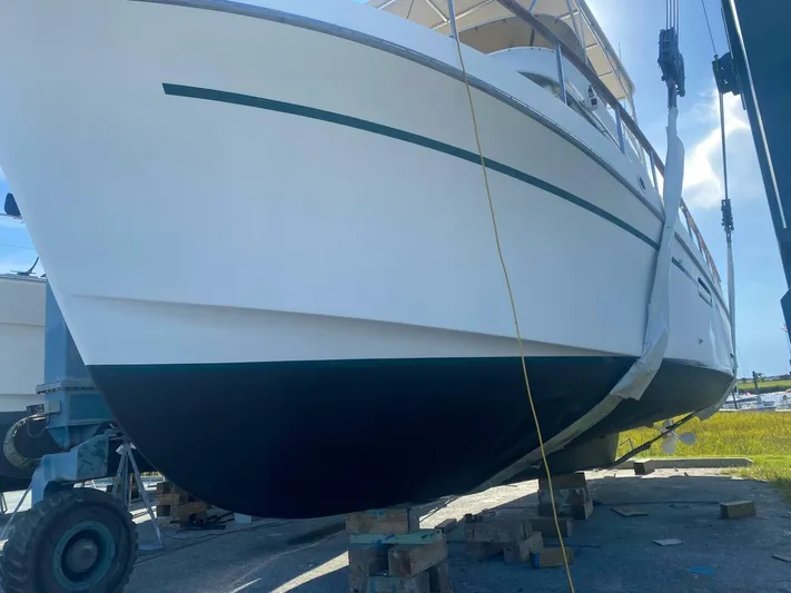 Sundog Yacht Photos Pics 1996 Ocean Alexander 423 Classico yacht on dry dock for maintenance.