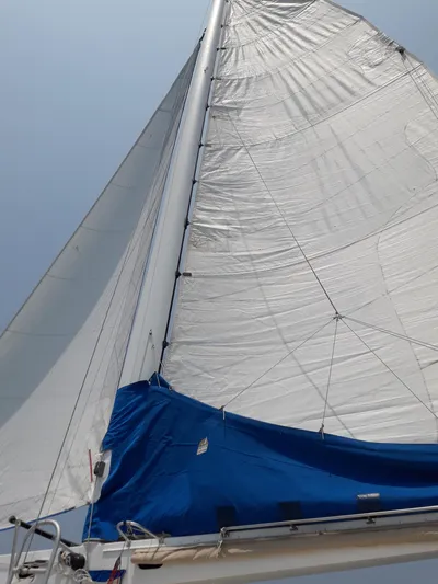 Panta Rhei Yacht Photos Pics Sailboat with white sails and blue cover, Custom Roake 50, 2012 model.