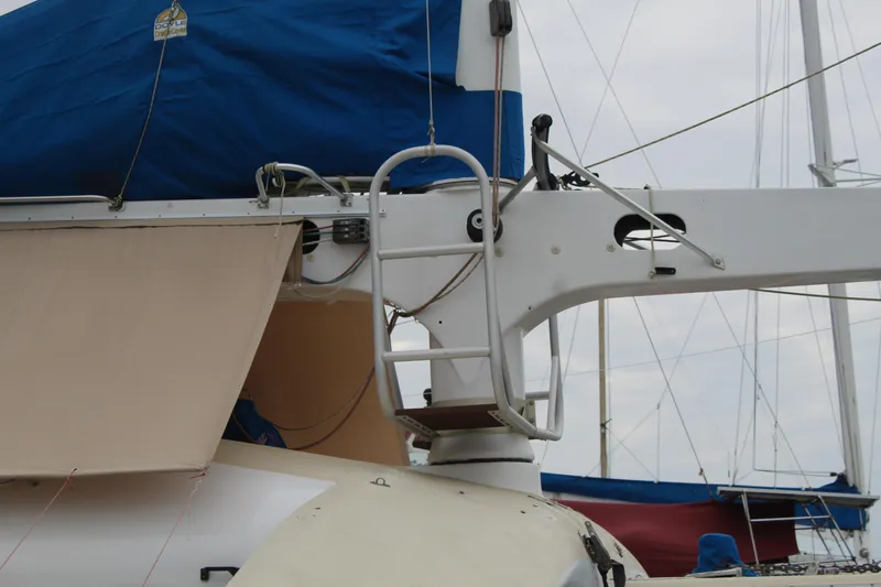 Panta Rhei Yacht Photos Pics Custom Roake 50 sailboat, 2012 model, featuring a blue sail cover and deck details.