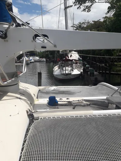 Panta Rhei Yacht Photos Pics Custom Roake 50 sailboat docked in a marina, 2012 model, sunny day.