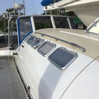 Panta Rhei Yacht Photos Pics Custom Roake 50 yacht, 2012 model, featuring sleek design and multiple windows.