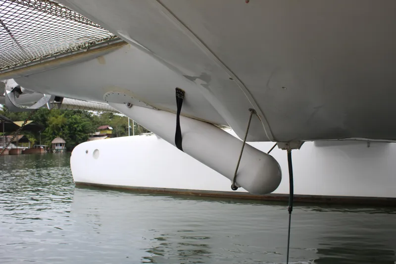 Panta Rhei Yacht Photos Pics Custom Roake 50 catamaran, 2012 model, moored on calm water.