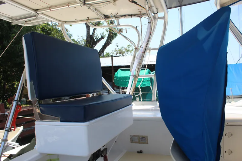 Panta Rhei Yacht Photos Pics Custom Roake 50 boat interior with blue cushioned seating, 2012 model.