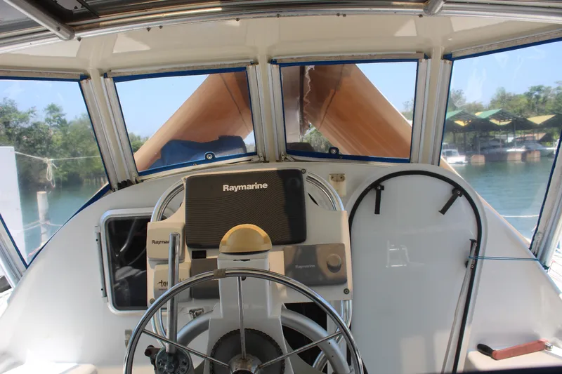 Panta Rhei Yacht Photos Pics Helm of 2012 Custom Roake 50 boat with Raymarine navigation system.