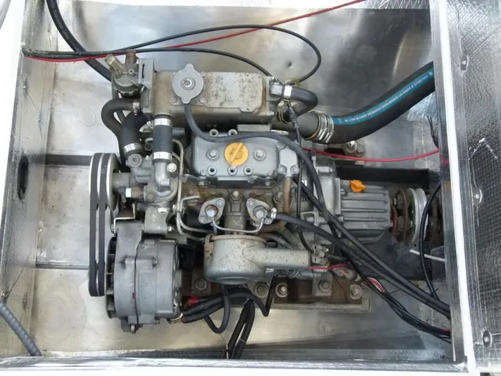 Panta Rhei Yacht Photos Pics Custom Roake 50 engine, 2012 model, in metallic compartment with visible wiring and hoses.