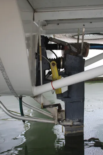 Panta Rhei Yacht Photos Pics Custom Roake 50 boat mechanism, 2012 model, partially submerged in water.