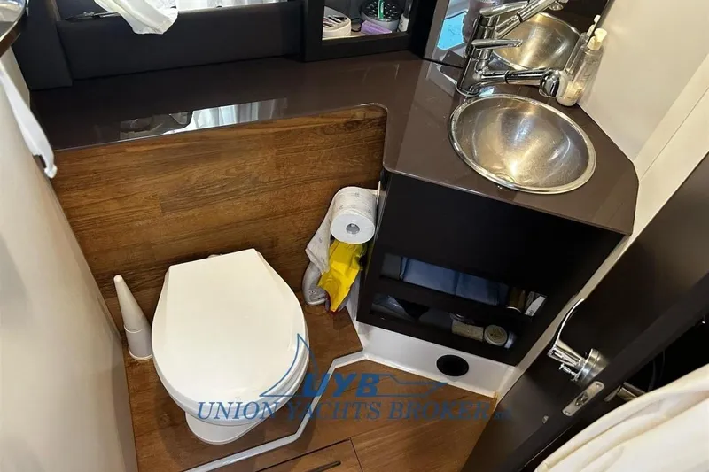  Yacht Photos Pics 2015 Cranchi M 44 HT yacht bathroom with modern sink and toilet.