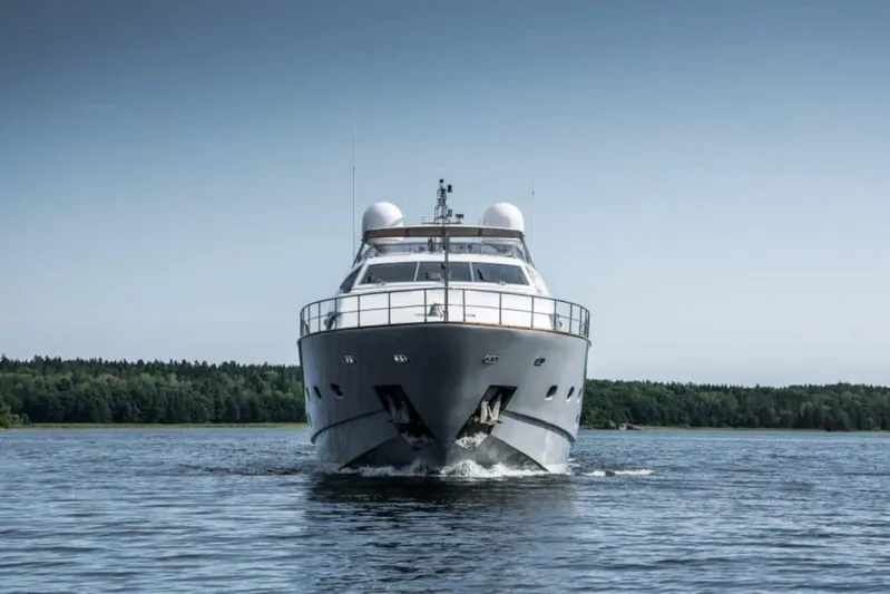 Queen Of Sheba Yacht Photos Pics Front view of 2006 Ferretti Yachts 112 Custom Line on calm water.