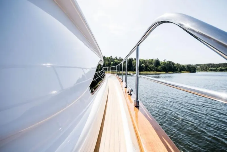 Queen Of Sheba Yacht Photos Pics Side view of 2006 Ferretti Yachts 112 Custom Line on calm water.