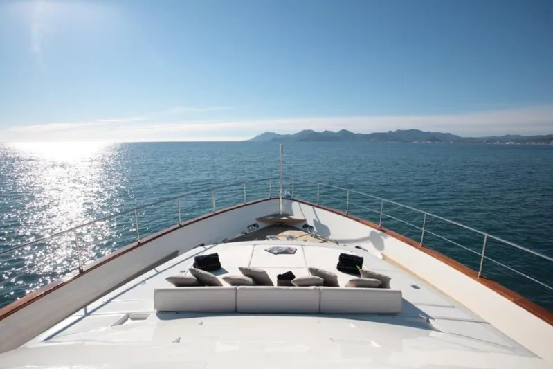 Queen Of Sheba Yacht Photos Pics Luxurious 2006 Ferretti Yachts 112 Custom Line cruising on serene ocean waters.