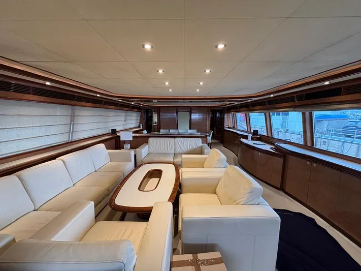 Queen Of Sheba Yacht Photos Pics Luxurious interior of 2006 Ferretti Yachts 112 Custom Line with elegant seating and wood accents.