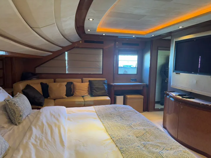 Queen Of Sheba Yacht Photos Pics Luxurious bedroom interior of 2006 Ferretti Yachts 112 Custom Line with modern amenities.