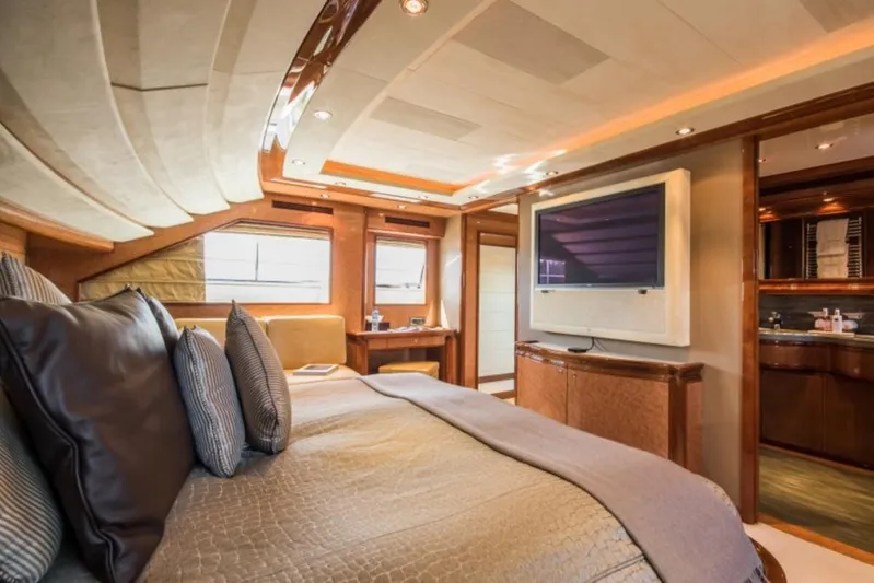 Queen Of Sheba Yacht Photos Pics Luxurious bedroom interior of 2006 Ferretti Yachts 112 Custom Line with elegant furnishings.