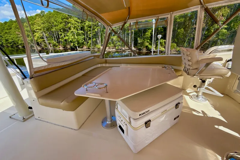 Blue Note Yacht Photos Pics Luxurious 2007 Mainship 430 Trawler interior with seating, table, and scenic view.