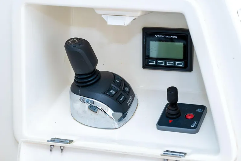  Yacht Photos Pics Control panel of a 2019 Prestige 500 yacht with joystick and display.