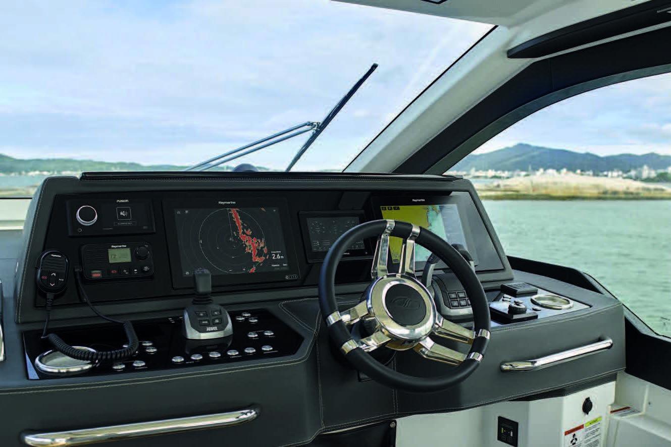 Cockpit of 2025 Schaefer 375 HT yacht with advanced navigation system.