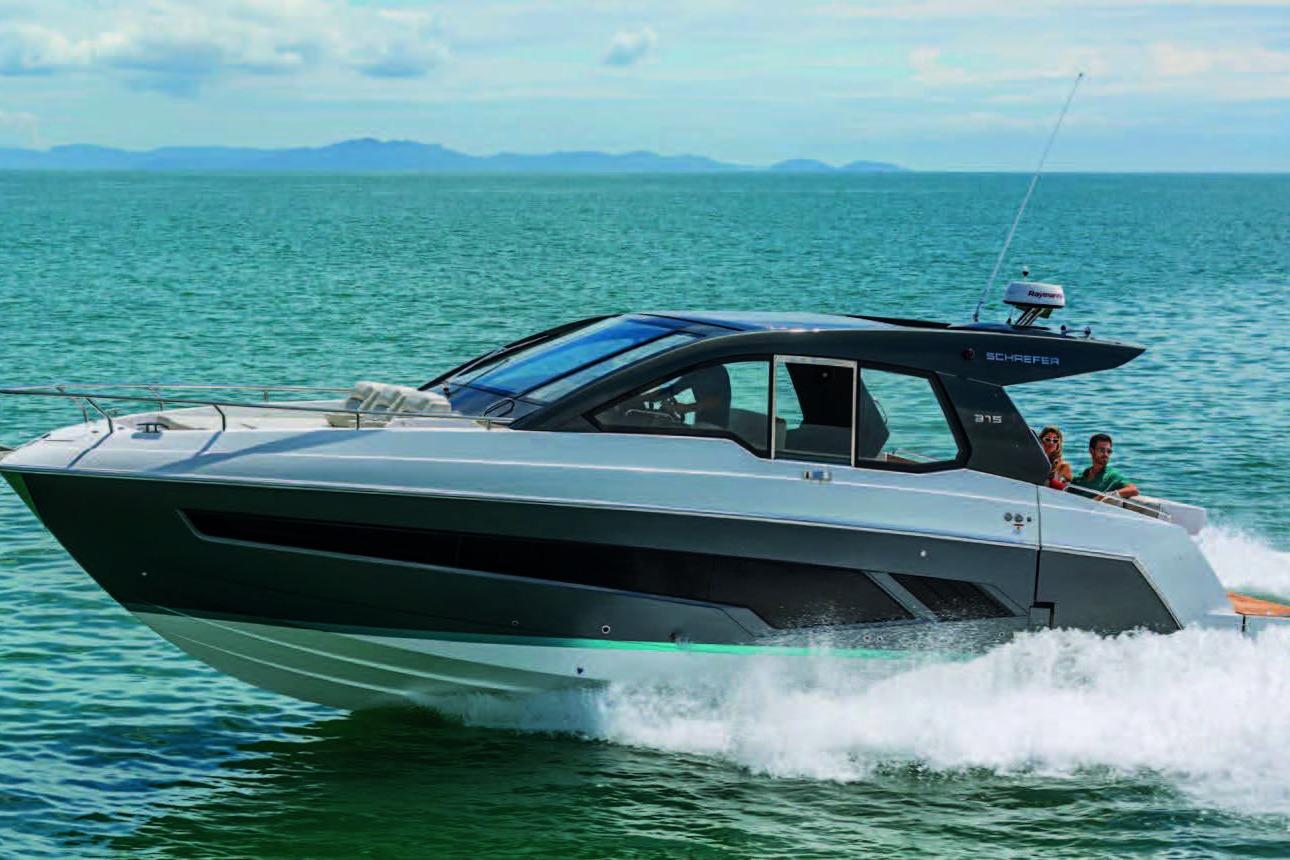 2025 Schaefer 375 HT yacht cruising on open water, showcasing sleek design and performance.