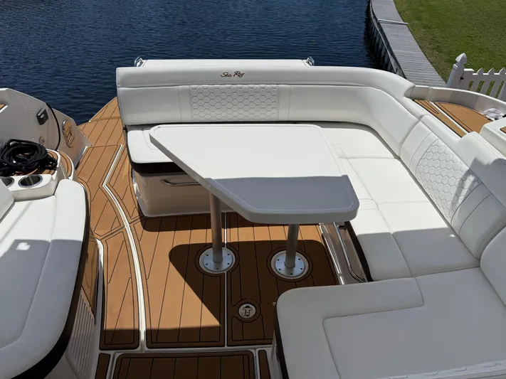  Yacht Photos Pics Luxurious seating area on 2021 Sea Ray Sundancer 350 Coupe yacht with elegant table.