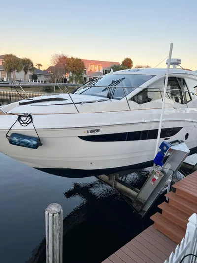  Yacht Photos Pics 2021 Sea Ray Sundancer 350 Coupe docked by waterfront homes.