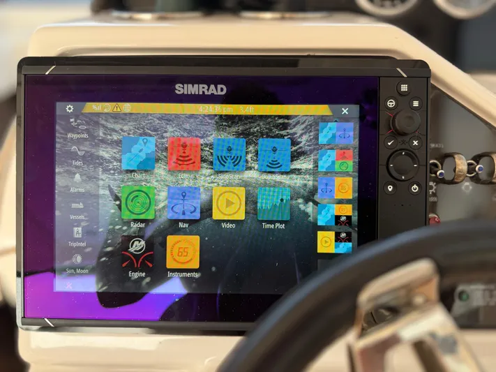  Yacht Photos Pics Simrad navigation display on 2021 Sea Ray Sundancer 350 Coupe, showing various control icons.