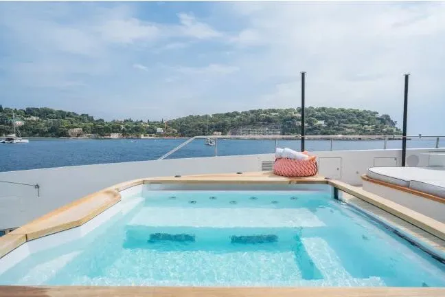  Yacht Photos Pics Luxurious 2023 Benetti Motopanfilo 37M yacht with a scenic deck jacuzzi.