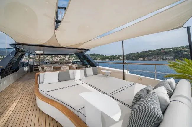  Yacht Photos Pics Luxurious 2023 Benetti Motopanfilo 37M yacht deck with elegant seating and ocean view.