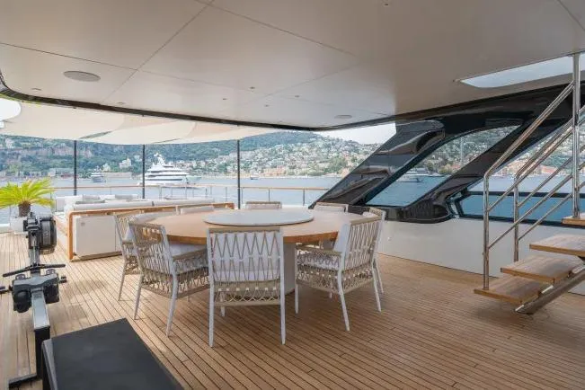  Yacht Photos Pics Luxurious deck of 2023 Benetti Motopanfilo 37M yacht with elegant seating and scenic views.