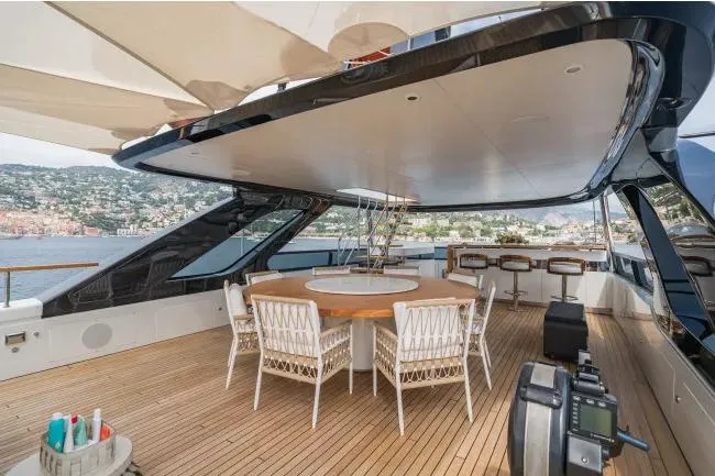  Yacht Photos Pics Luxurious 2023 Benetti Motopanfilo 37M yacht deck with elegant seating and scenic views.