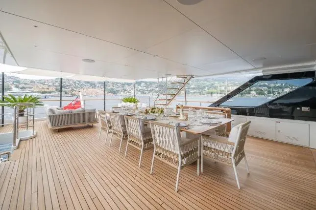  Yacht Photos Pics Luxurious dining area on 2023 Benetti Motopanfilo 37M yacht with scenic views.
