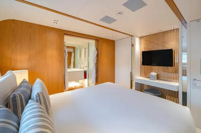  Yacht Photos Pics Luxurious bedroom interior of 2023 Benetti Motopanfilo 37M yacht with modern design elements.