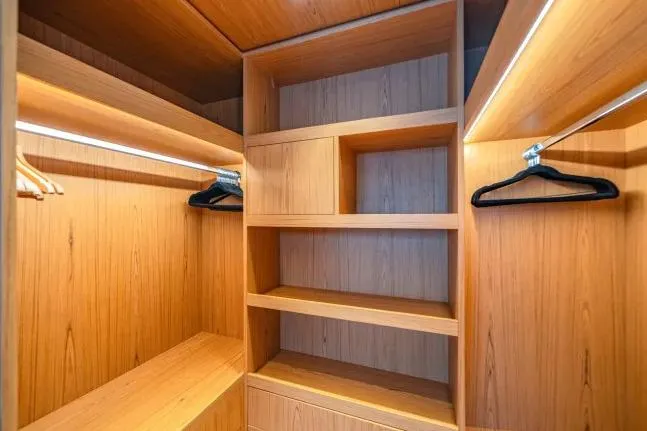  Yacht Photos Pics Luxurious wooden closet interior on Benetti Motopanfilo 37M yacht, 2023 model.
