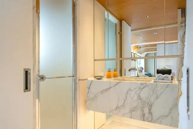 Yacht Photos Pics Luxurious bathroom on 2023 Benetti Motopanfilo 37M yacht with marble sink and modern design.