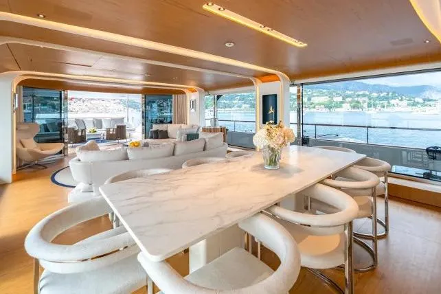  Yacht Photos Pics Luxurious interior of 2023 Benetti Motopanfilo 37M yacht with elegant dining area and scenic views.