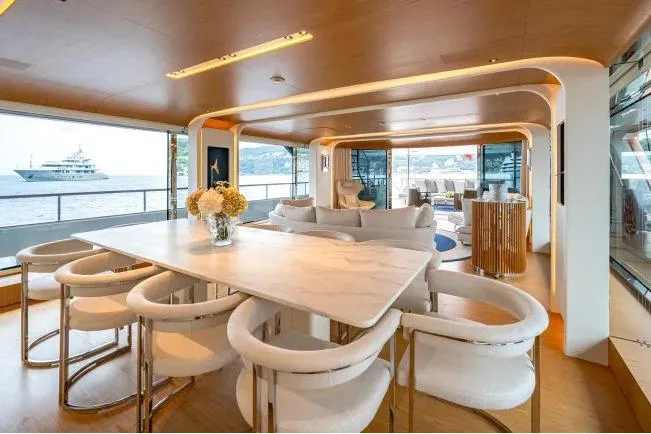  Yacht Photos Pics Luxurious interior of 2023 Benetti Motopanfilo 37M yacht with elegant dining area and sea view.
