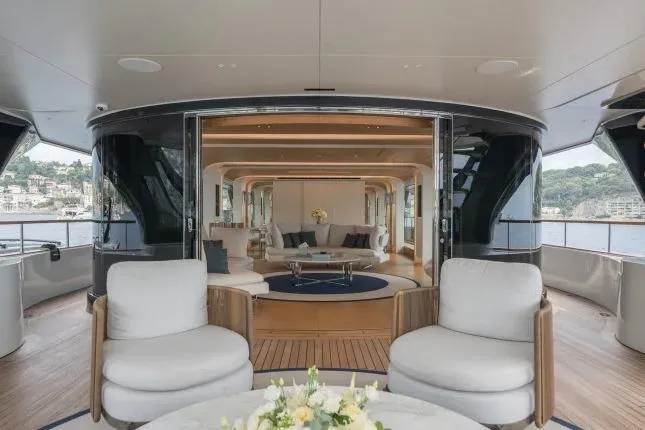  Yacht Photos Pics Luxurious 2023 Benetti Motopanfilo 37M yacht interior with elegant seating and scenic views.