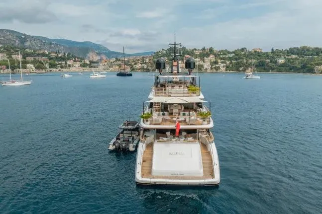  Yacht Photos Pics Luxury Benetti Motopanfilo 37M yacht, 2023 model, anchored in scenic coastal waters.