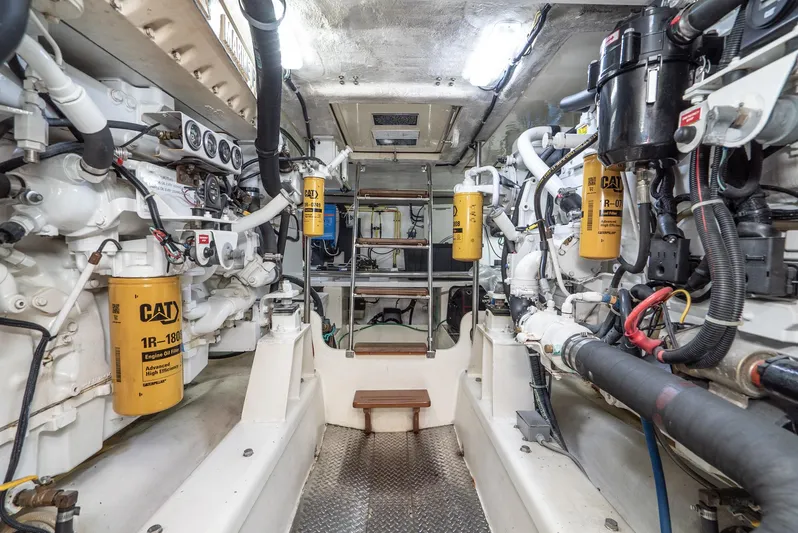Nick Of Time Yacht Photos Pics Engine room of a 2007 Midnight Lace Sport Cruiser with CAT machinery and equipment.